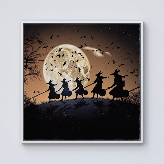 A Group Of Witches Riding Broomsticks Framed Canvas